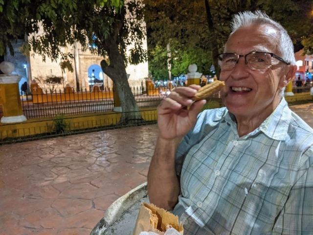 Enjoying a churro in Centro Valladolid at night